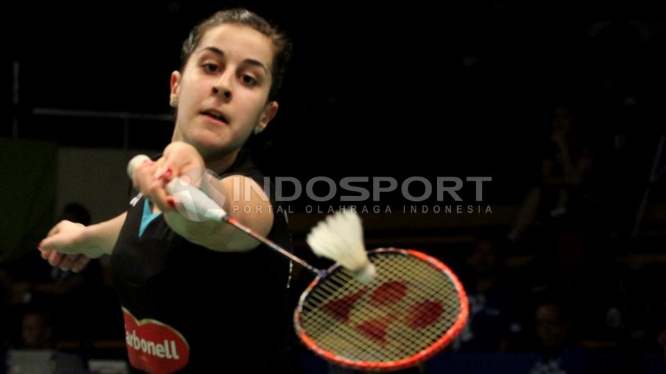 Juara dunia 2014, Carolina Marin tersingkir lebih awal setelah tumbang di tangan wakil Jepang, Yui Hashimoto, Rabu (03/06/15).